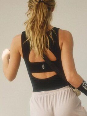 NWT Free People Movement Free Throw Unwind Cami Black size- MEDIUM/ LARGE